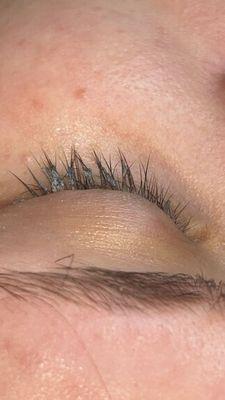 The adhesive that never came off. This is after washing the lashes.