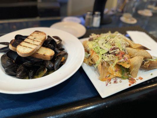 Cajun Mussels & nachos Definitely try the Cajun style mussels! Both Excellent!