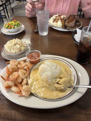Crab Bisque served in a bread bowl with 1/2 lb of shrimp with a side of coleslaw.