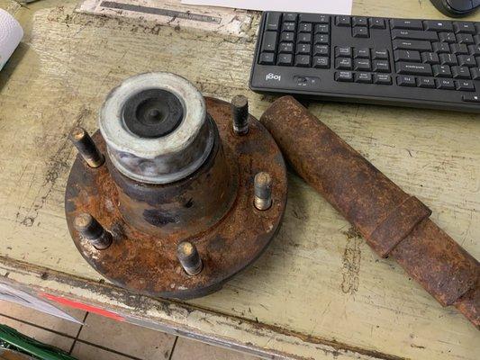 Old rusty trailer parts.