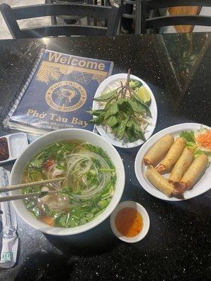 Shrimp Eggrolls w/ sweet & sour sauce Shrimp Pho w/ bean sprouts , lime , jalapeños & basil