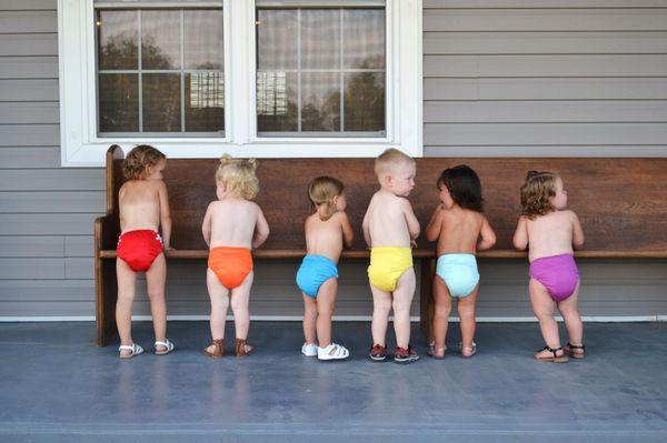 Colorful baby bottoms! Let us do your dirty work and wash your cloth diapers for you.