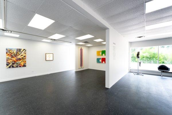 Interior of art gallery with paintings