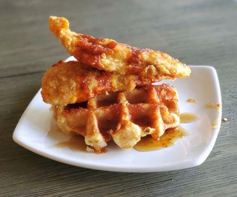 Chicken & Waffles with Nashville hot sauce and maple syrup!