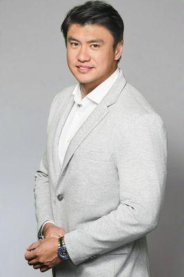 Headshot of handsome asian businessman.