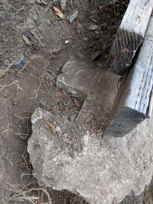 Setting the fence post in concrete on three sides... Who does this kind of work ?!