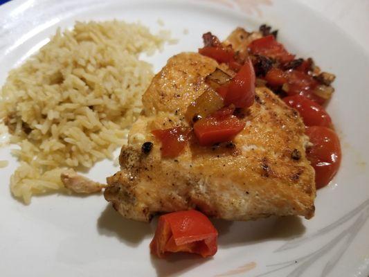 salmon steak with rice and seasonal veggies salmon was cooked perfectly! pink on the inside