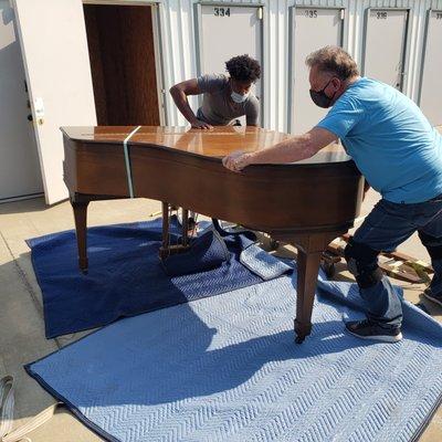 Moving out of the storage unit. My piano is on the extra heavy side. They did great!