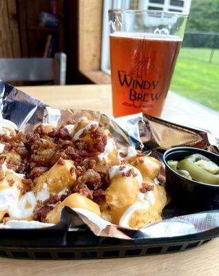 Loaded tater tots appetizer and summer wheat beer