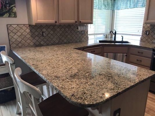Our new granite countertops in Venetian Gold!!