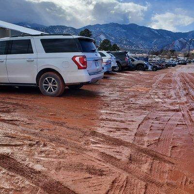 This is the parking lot. Snow melting. Ruined my leather . The Broadmoor owns this place.