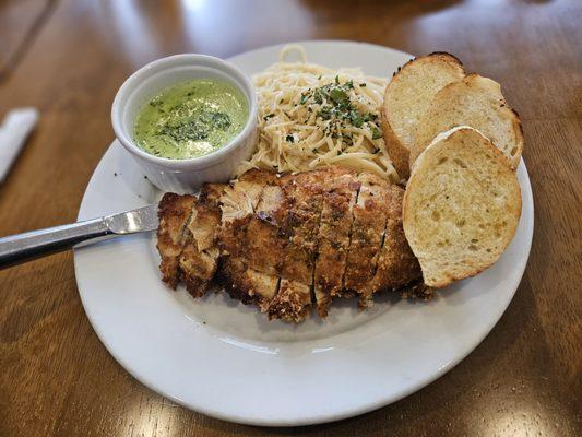Chicken fontana with pesto sauce on the side