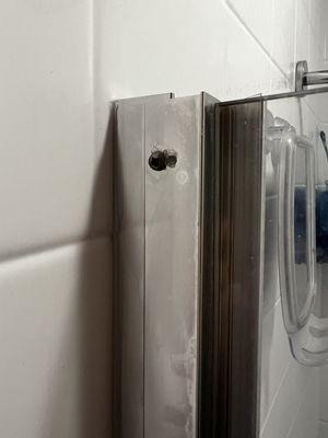 Unappealing extra holes on shower door