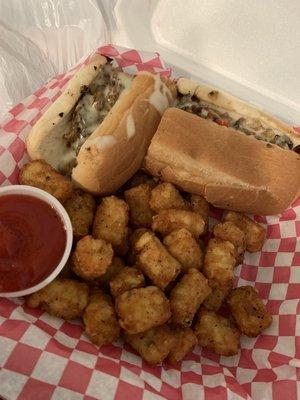 Philly cheese with onion and peppers, with a side of tater tots.