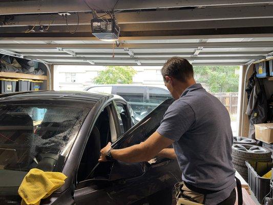 Mobile Window tint in action. We can tint right in your own garage with shop level quality.