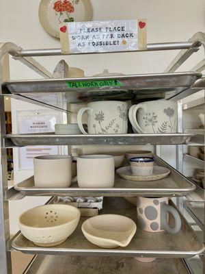 I could not stop staring at the dandelion mugs....and the polka dotted mug??? Wow the talent