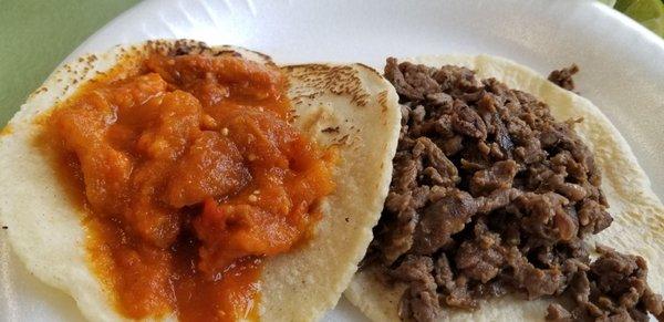 Chicharron and carne asada taco