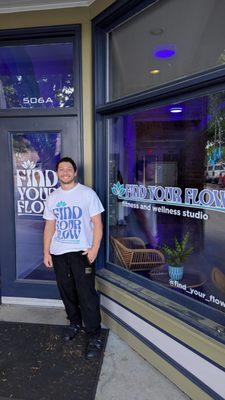 Jake, one of the owners in front of the new place