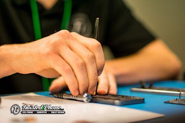 Technician working on smart device.