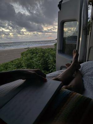 The bed with doors open.