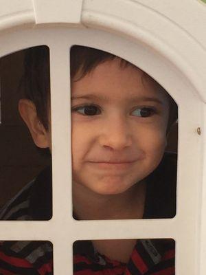 Enjoying the playground play house