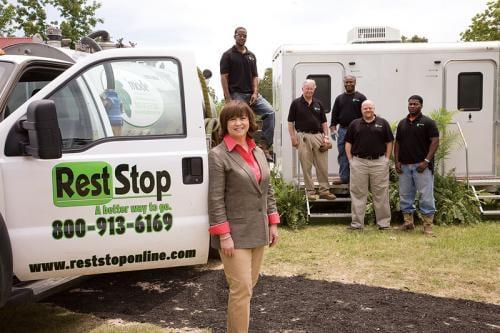 Nita Bailey (CEO) pictured with employees including Roger Harp (COO) and Matthew Stephenson