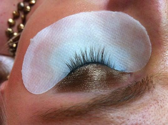 These are before and after photos of eyelash extensions performed by Cynthia Wortmann.