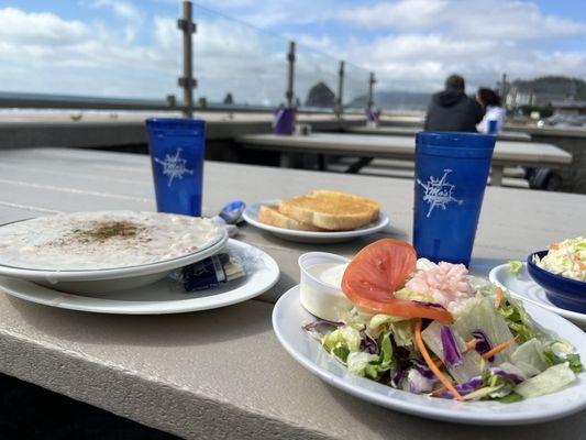 Clam chowder, garlic parm bread, salad and slaw
