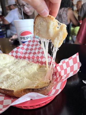 Garlic bread - look at the cheese stretching!!