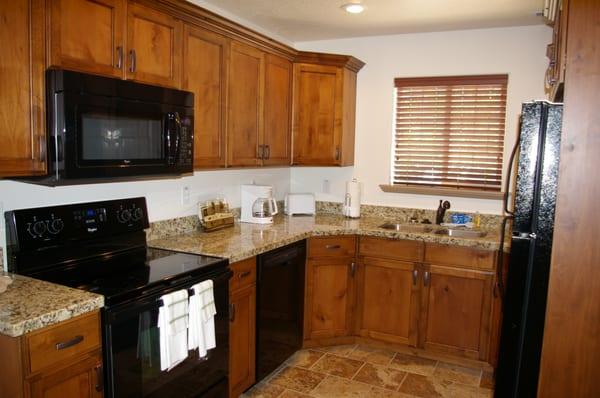 Our Townhome Suites have fully stocked kitchens, including dining table with seating for 6