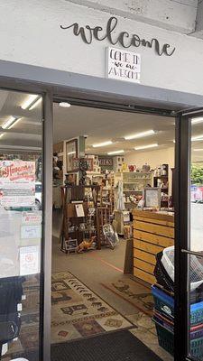 Little sign says, "Come In We are Awesome!"