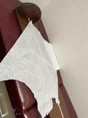 How he measured my sons height. Barely covered with paper. Hard board.