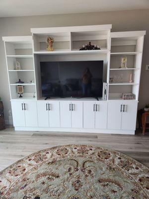 Classy closets designed this beautiful entertainment center for us