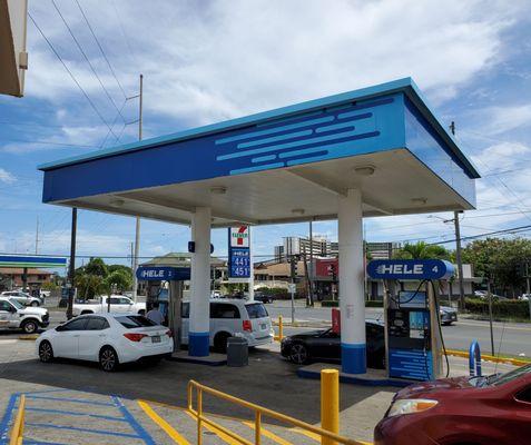 Da Hele Gas Station has two gas pumps, and is attached to a 7-Eleven convenience store.