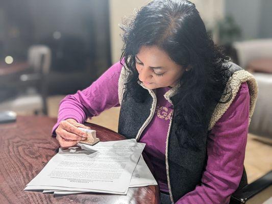 Mausami completing the notary.