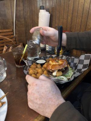 Curd burger on pretzel bun