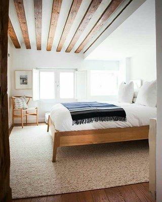 Add a rustic yet cozy environment by creating wood ceiling beams.