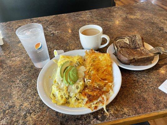 Breakfast Monterey omelet with rye toast.