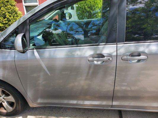 dent scratch by left side slides door
