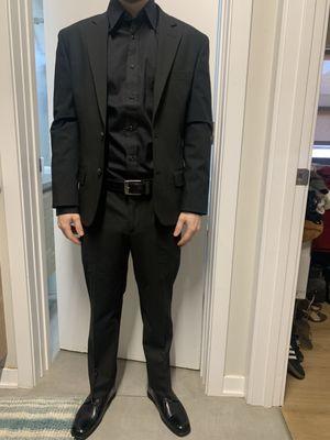 The altered suit fit like a glove.