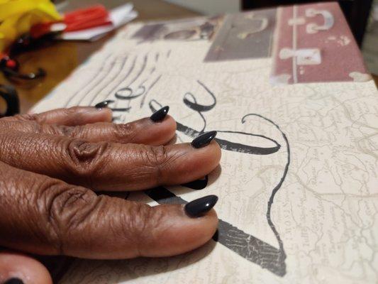 Older woman did a very poor job. Almost all nails are angled up and look unnatural. My thumbs are not angled up - they are crooked instead