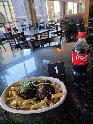 My Oxtail dish and a Coke.
