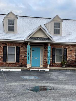 I'm located upstairs inside the Olivia Pacianos Salon. State Farm insurance is next door.