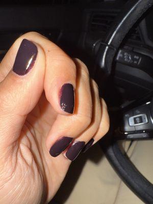 Smudged nail that they refused to fix even though it was their fault because they didn't let me stay to dry long enough.