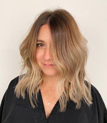 Added depth back with lowlights and played up her texture of her new cut.