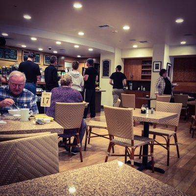 This small cafe is attached to the Hallmark Inn. They have short hours but open early. It is walking distance from the train station.