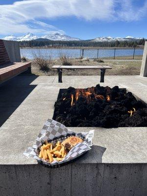 Cubano sandwich (already half eaten...) and fries with a killer view. Inside and outside self-seating