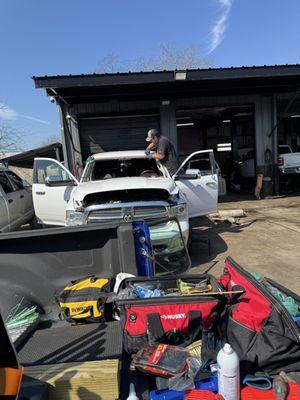My worker changing out a Windshield