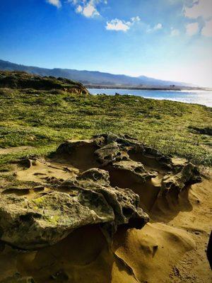 Tafoni sandstone formations near Smugglers Cove facing South towards Año Nuevo State Park.