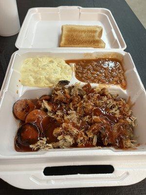 Pulled pork with sausage, very mustard, potato salad, and lackluster baked beans.
